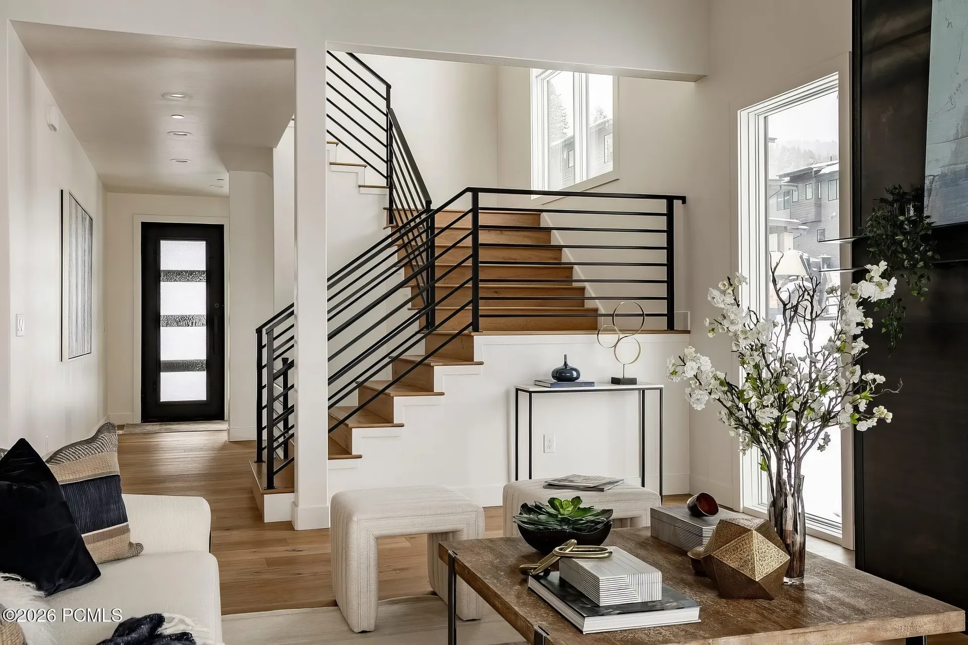 Architectural stair hall with warm material detailing