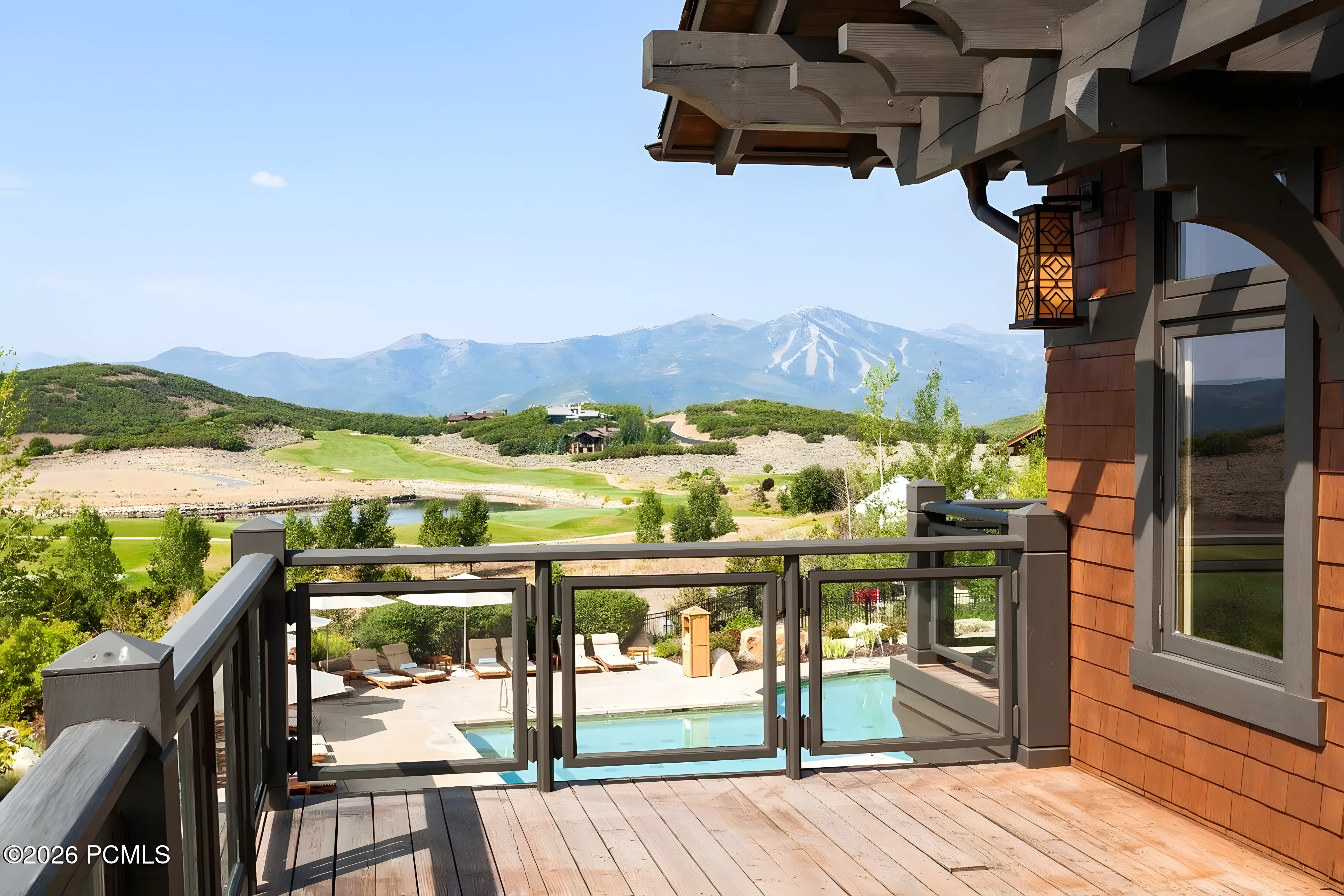 Talisker Club deck with golf and mountain views