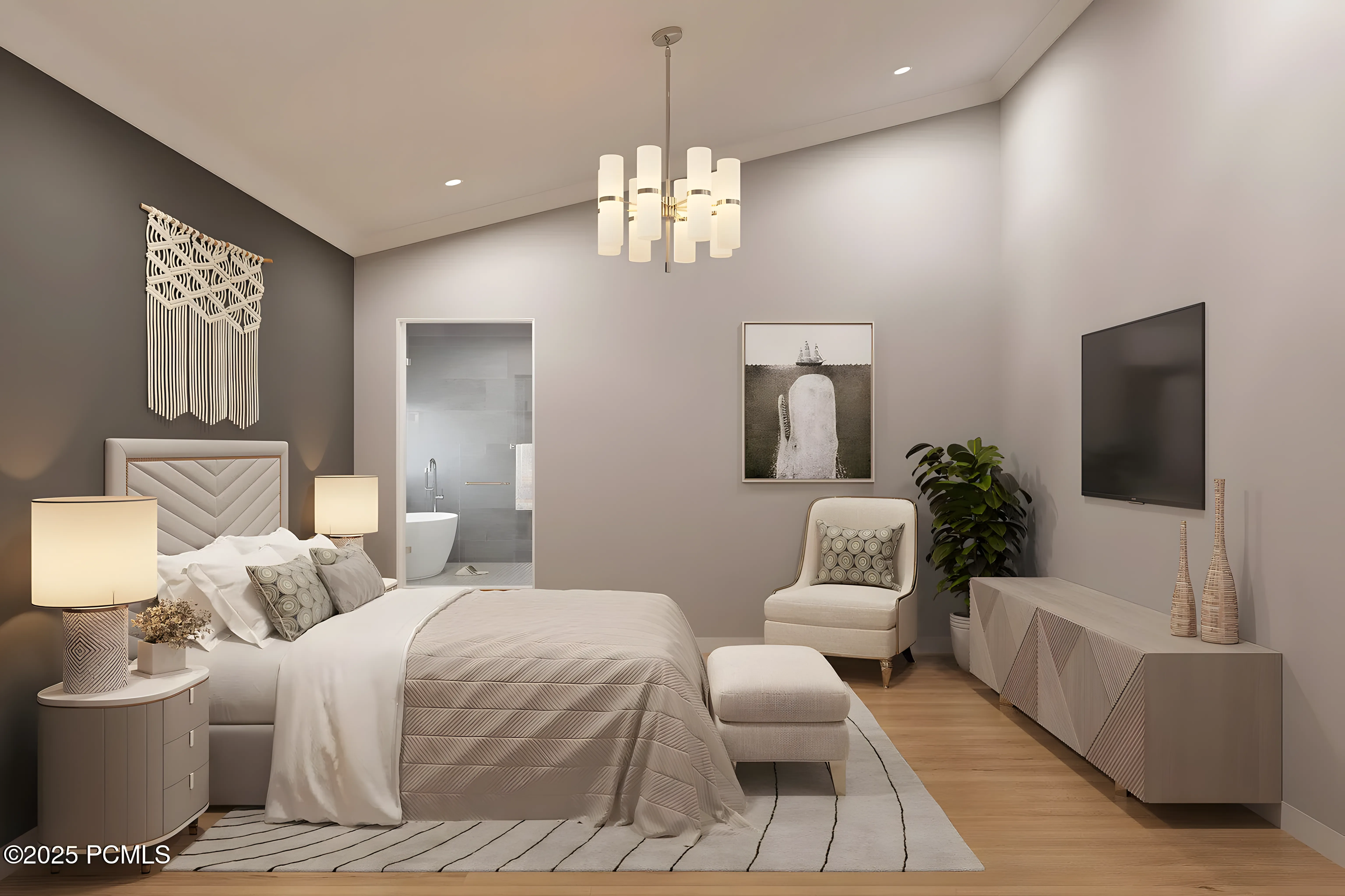 Park City Hideaway primary bedroom with vaulted ceiling and en suite