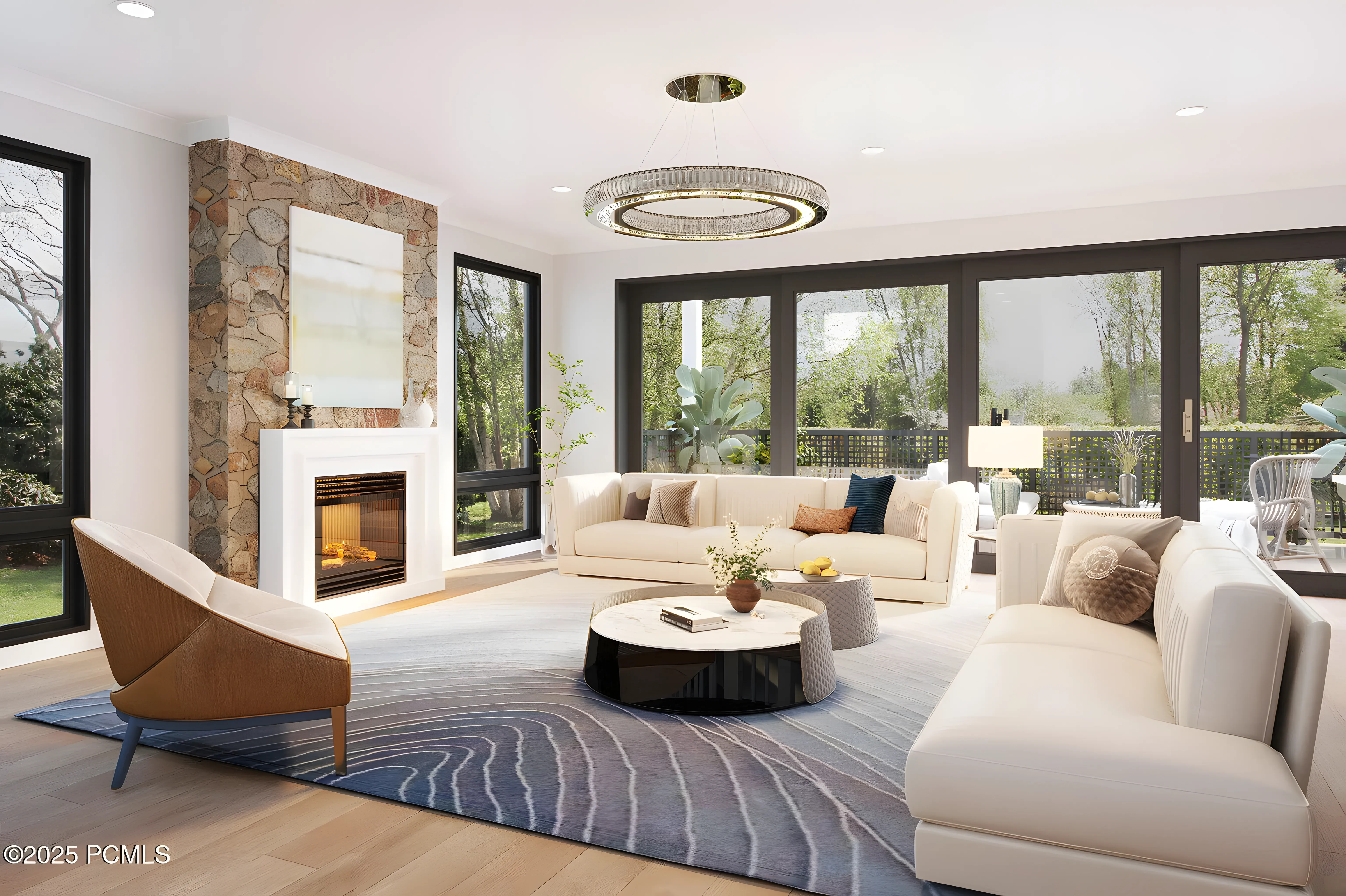 Park City Hideaway great room with stone fireplace and mountain views